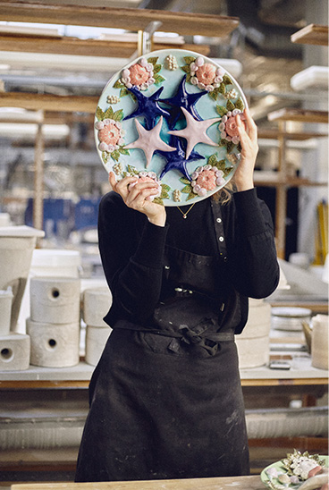 Klara Lilja With one of her art pieces for Royal Copenhagen